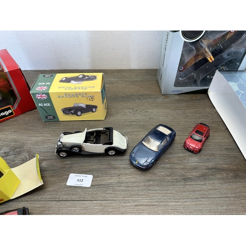 512 - Ten boxed and unboxed die-cast model vehicles to include Bburago Ferrari 250 TestaRossa (1957), Oxfo... 