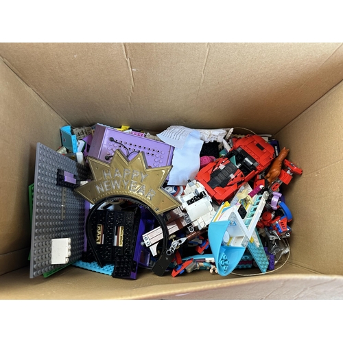 519 - A box containing Lego and Wilko model building accessories and figures to include Lego Ferrari etc.