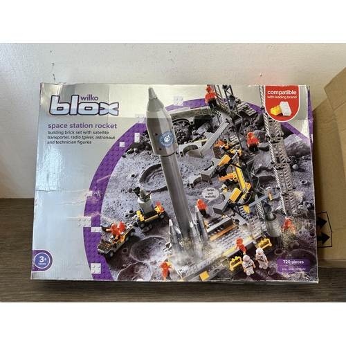 519 - A box containing Lego and Wilko model building accessories and figures to include Lego Ferrari etc.