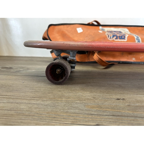 520 - A 1970s Lotus plastic skateboard with carrycase - approx. 60cm long