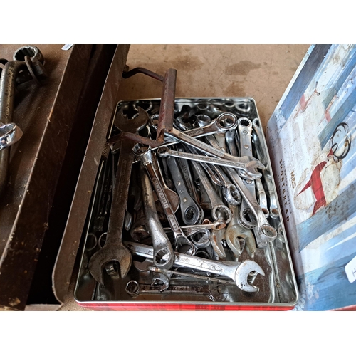 1052 - Three boxes containing a collection of tools to include spanners, tin snips etc.