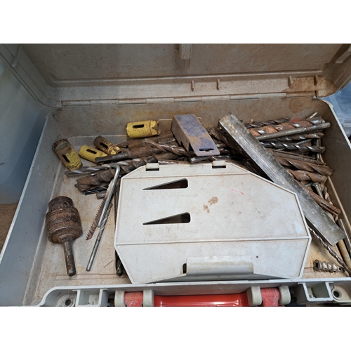 1070 - A large collection of tools to include pair of Record 1216 G-Clamps, cased Bosch jigsaw, nuts and bo... 