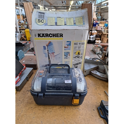 1077 - Two items, one boxed Karcher SC1122 and one cased Performance Pro rotary tool kit with instructions ... 