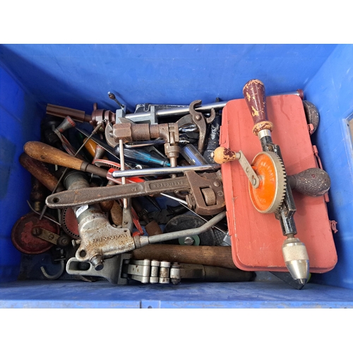 1083 - Two boxes containing a large collection of tools to include pipe wrenches, vintage hand drills, span... 