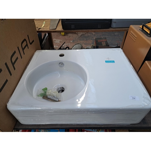 1090 - A boxed Cifial 60cm wash basin