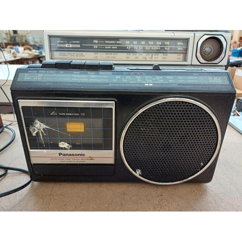 874 - Two vintage portable radio/cassette players, one Sanyo M2563LG four-band and one Panasonic RX-1210 t... 