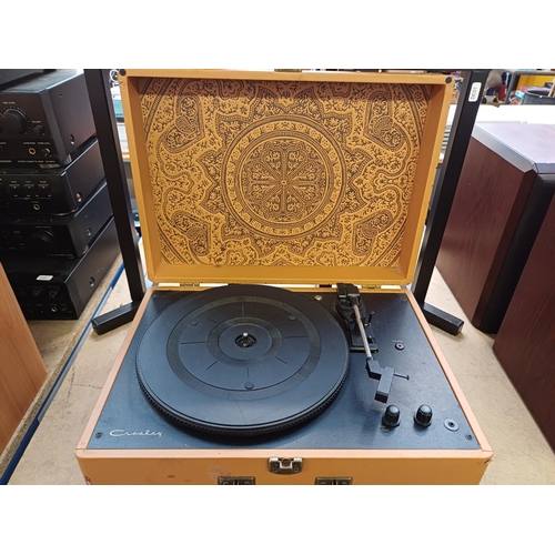 885 - A Crosley CR6249U-EM1 three-speed portable record player