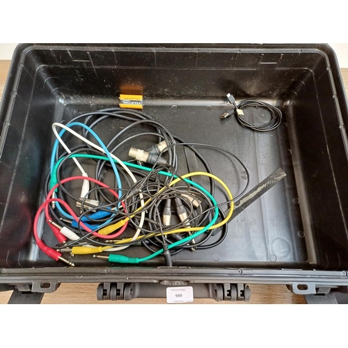 949 - A plastic flight case containing Shure SM58 professional cardioid dynamic microphone, cables etc.