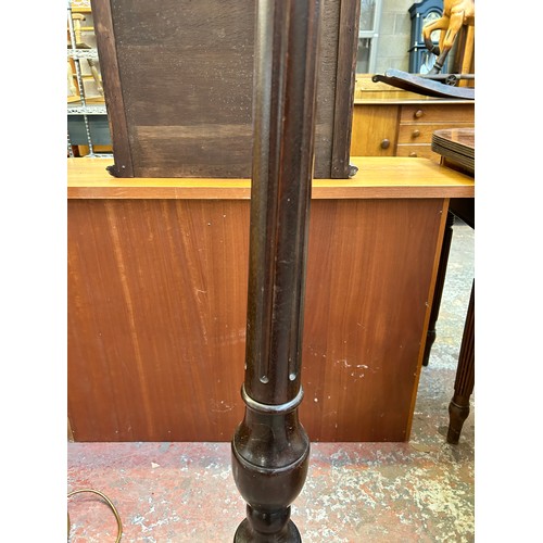 65A - A mahogany standard lamp - approx. 160cm high