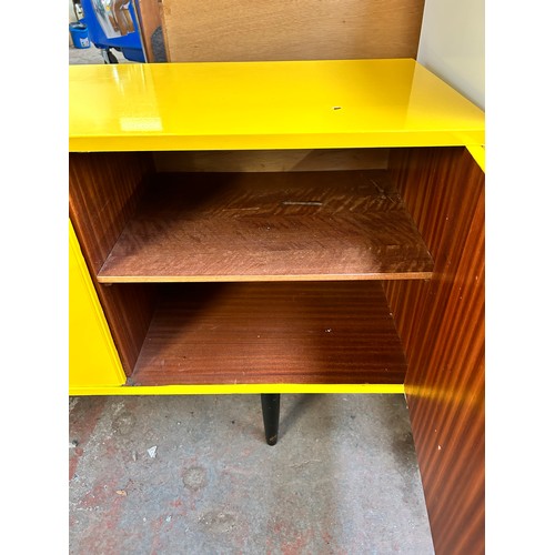 140A - A mid 20th century yellow and black vinyl wrapped sideboard - approx. 76cm high x 168cm wide x 44cm ... 