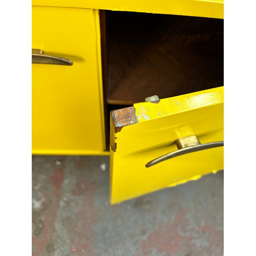 140A - A mid 20th century yellow and black vinyl wrapped sideboard - approx. 76cm high x 168cm wide x 44cm ... 