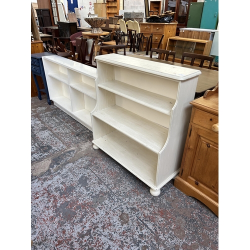 102 - Two white painted bookcases, one three tier waterfall - approx. 99cm high x 94cm wide x 37cm deep an... 