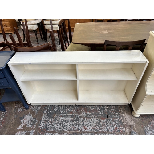 102 - Two white painted bookcases, one three tier waterfall - approx. 99cm high x 94cm wide x 37cm deep an... 