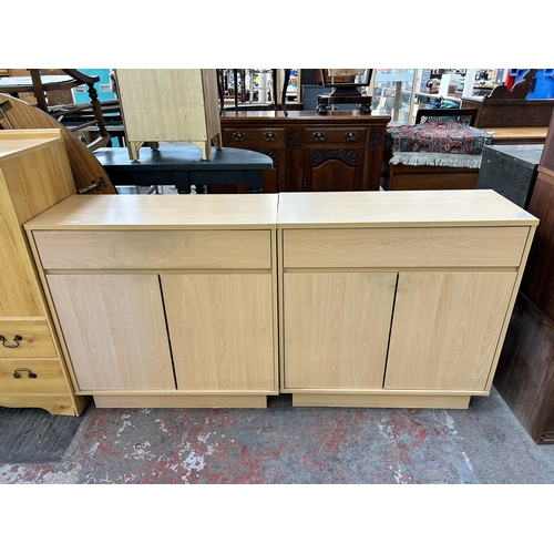 114 - Two modern beech effect sideboards - each approx. 80cm high x 79cm wide x 34cm deep