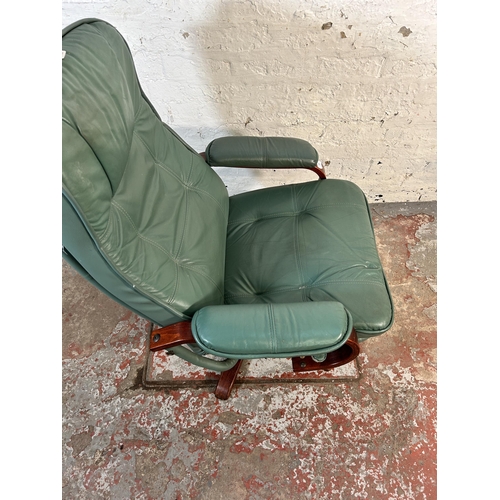 119 - A Stressless style green leather and bentwood swivel armchair