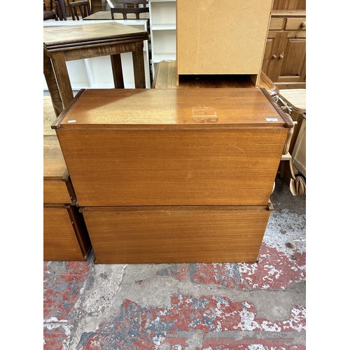 127 - Four 1970s teak wall units - largest approx. 37cm high x 82cm wide x 37cm deep