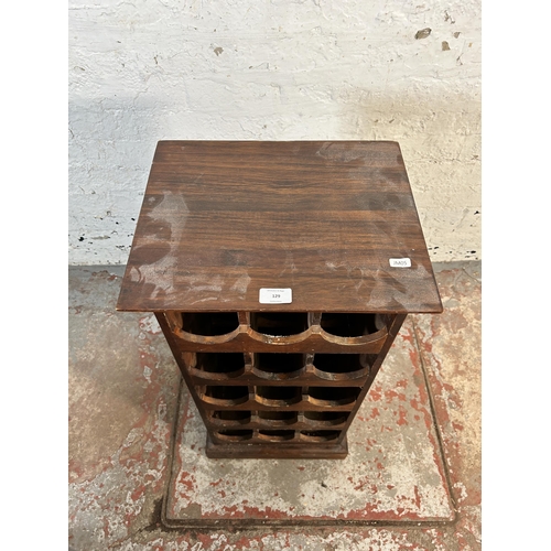 129 - A modern wood effect fifteen section bottle rack - approx. 80cm high x 38cm wide x 31cm deep