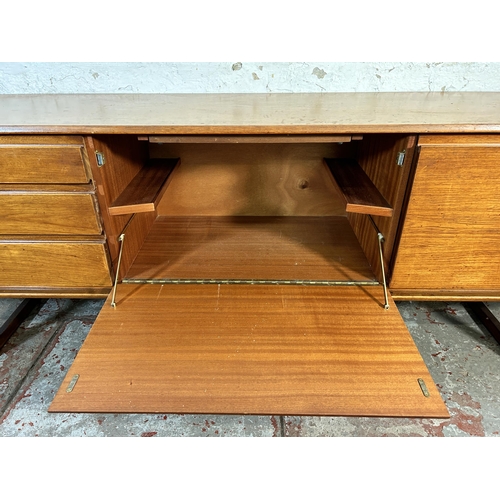 141 - A mid 20th century White & Newton teak sideboard - approx. 70cm high x 217cm wide x 44cm deep