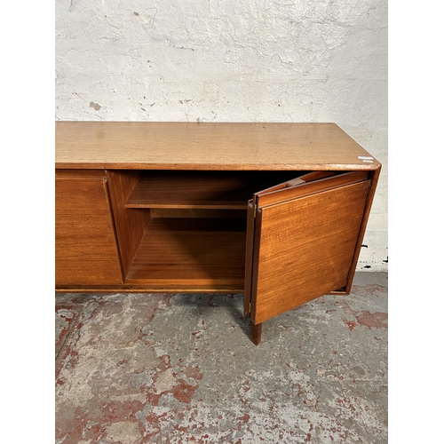 141 - A mid 20th century White & Newton teak sideboard - approx. 70cm high x 217cm wide x 44cm deep