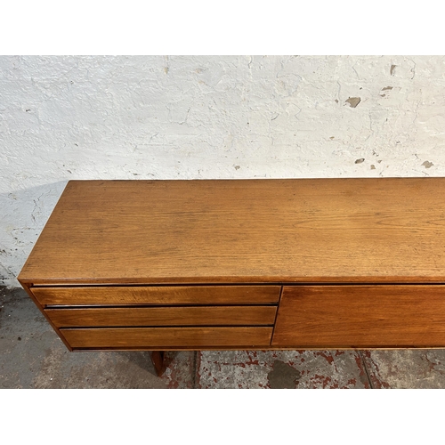 141 - A mid 20th century White & Newton teak sideboard - approx. 70cm high x 217cm wide x 44cm deep