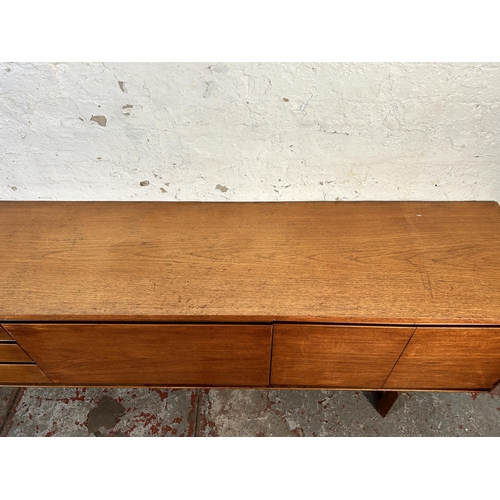 141 - A mid 20th century White & Newton teak sideboard - approx. 70cm high x 217cm wide x 44cm deep