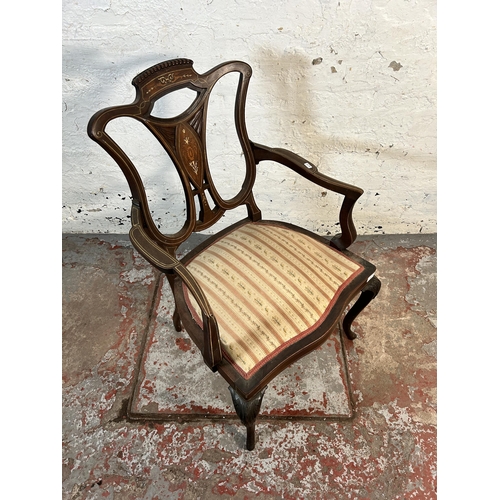 145 - An Edwardian inlaid mahogany and rosewood open armchair