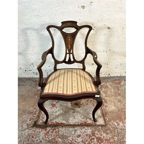 145 - An Edwardian inlaid mahogany and rosewood open armchair