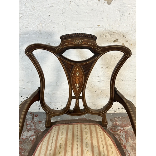 145 - An Edwardian inlaid mahogany and rosewood open armchair