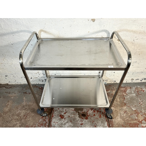 148 - A stainless steel two tier catering trolley - approx. 94cm high x 51cm wide x 83cm deep