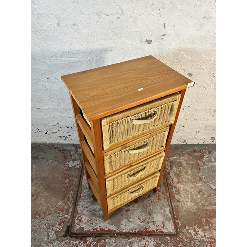 149 - A modern beech and wicker chest of drawers - approx. 100cm high x 51cm wide x 33cm deep