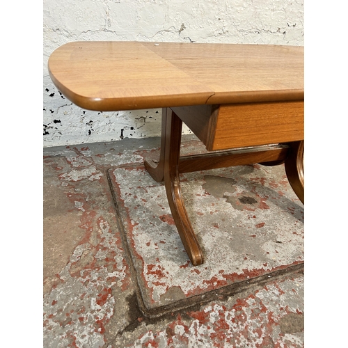 150 - A mid 20th century teak drop leaf side table