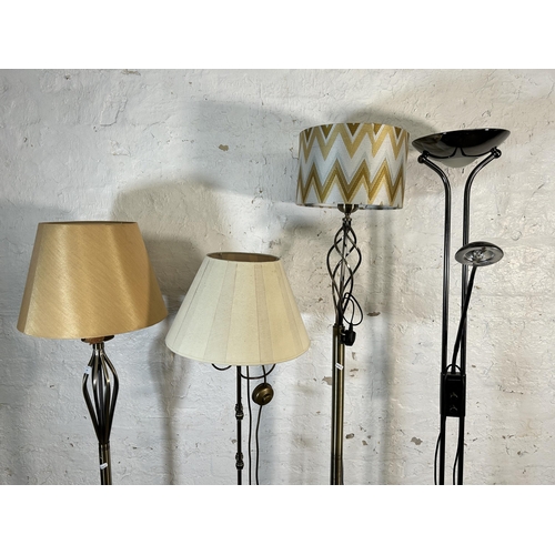 158 - Four modern standard lamps - largest approx. 182cm high