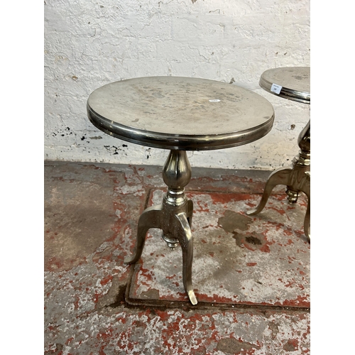 159 - A pair of modern aluminium circular tripod side tables - approx. 56cm high x 40cm diameter