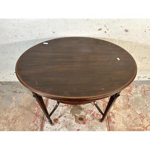 171 - An Edwardian inlaid mahogany oval two tier side table