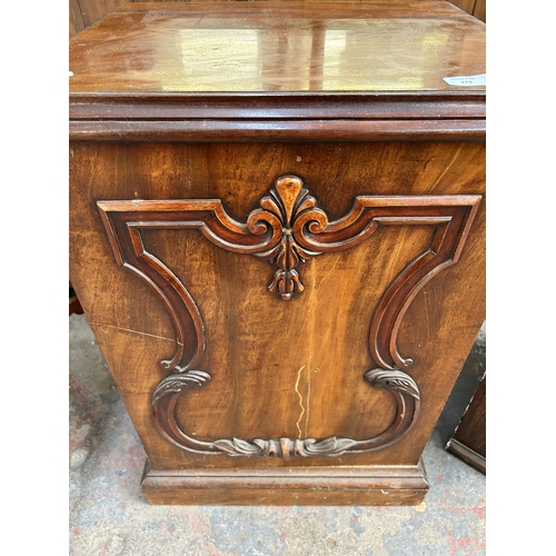 173 - A Victorian carved mahogany cabinet with fitted interior