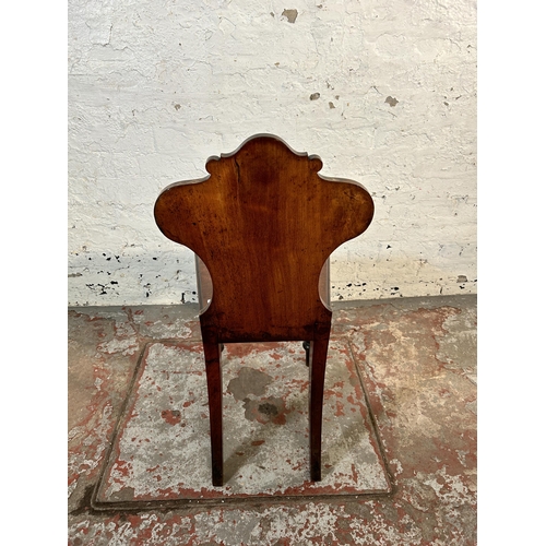 192 - A 19th century carved mahogany armorial hall chair - approx. 84cm high x 38cm wide x 37cm deep