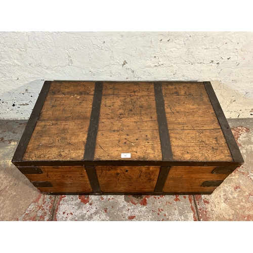 195 - A 19th century elm and metal banded blanket box - approx. 37cm high x 90cm wide x 49cm deep