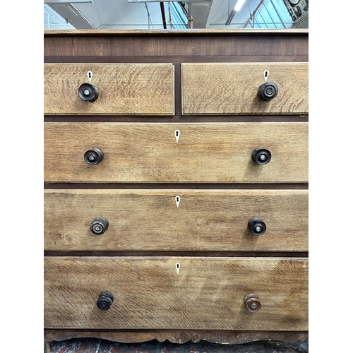 204 - A George IV oak and mahogany chest of drawers - approx. 132 high x 128cm wide x 53cm deep