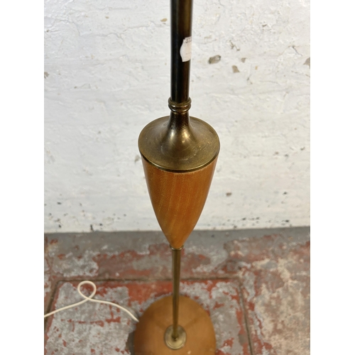 207 - A mid 20th century teak and brass standard lamp - approx. 128cm high