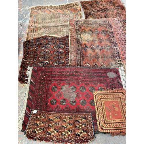 208A - A collection of Persian rugs - largest approx. 127cm x 83cm