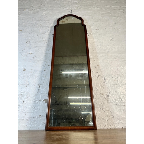 240 - A 19th century walnut framed wall mirror - approx. 127cm high x 37cm wide