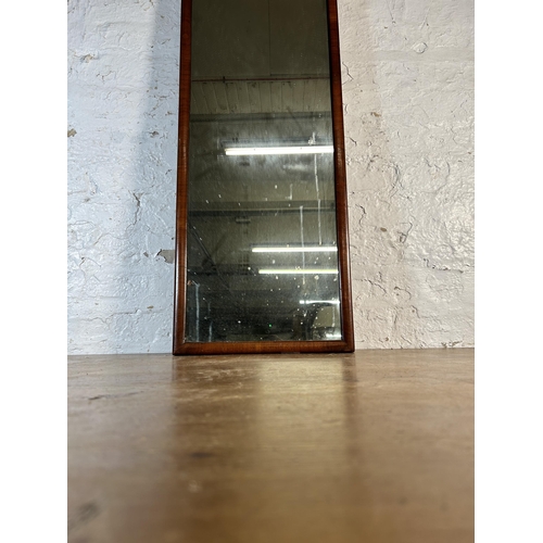 240 - A 19th century walnut framed wall mirror - approx. 127cm high x 37cm wide