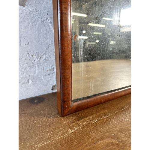 240 - A 19th century walnut framed wall mirror - approx. 127cm high x 37cm wide