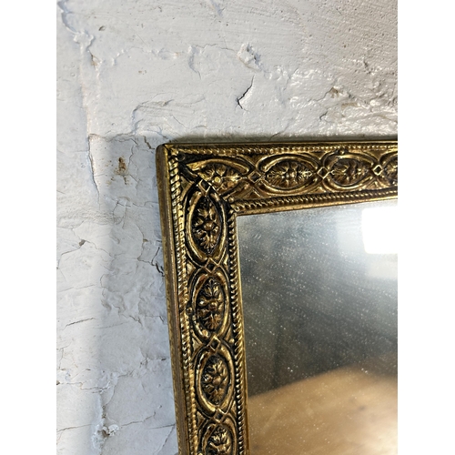 249 - Two wall mirrors, one gilt framed and one frameless bevelled edge