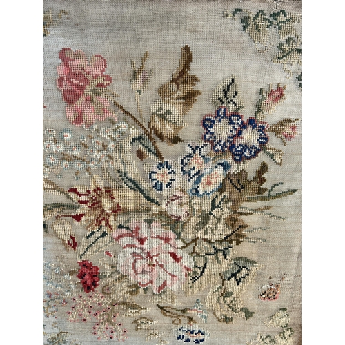 251 - A 19th century unframed floral embroidery - approx. 52cm high x 43cm wide