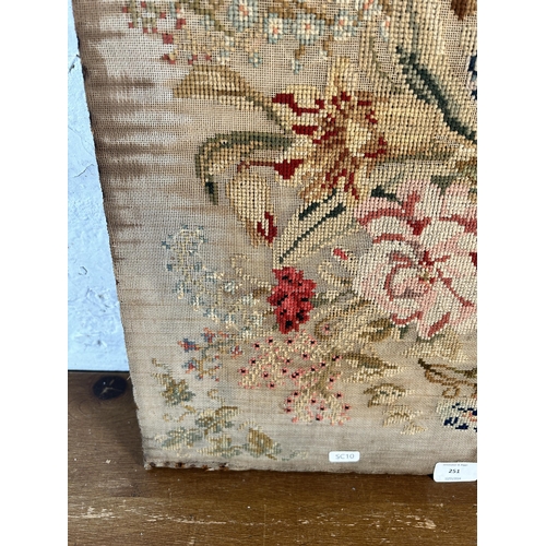 251 - A 19th century unframed floral embroidery - approx. 52cm high x 43cm wide