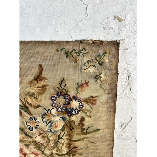 251 - A 19th century unframed floral embroidery - approx. 52cm high x 43cm wide