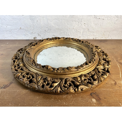 255 - A mid 20th century Atsonea gilt framed circular convex wall mirror - approx. 60cm diameter