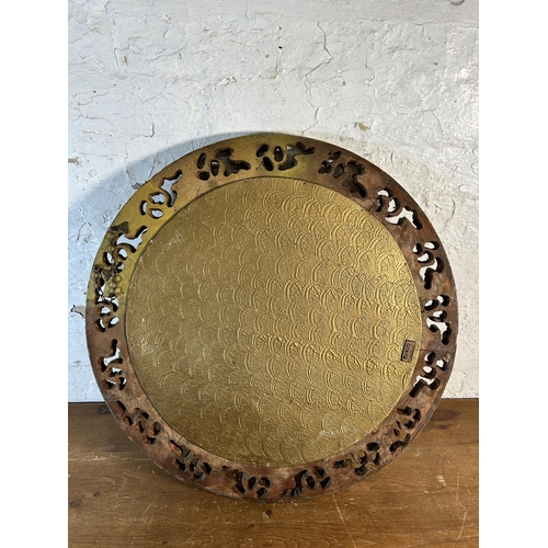 255 - A mid 20th century Atsonea gilt framed circular convex wall mirror - approx. 60cm diameter