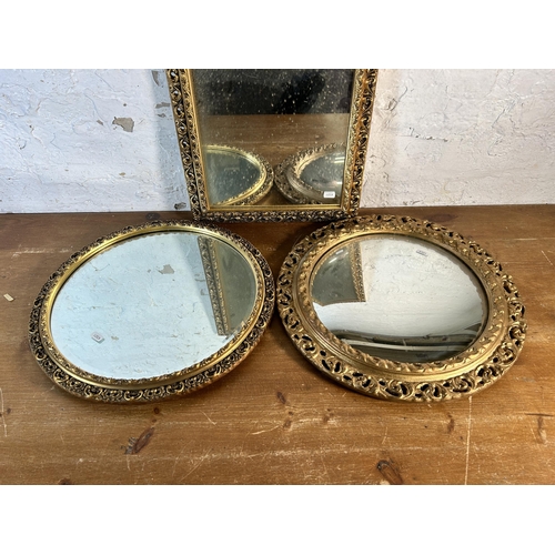 257 - Three gilt framed mirrors